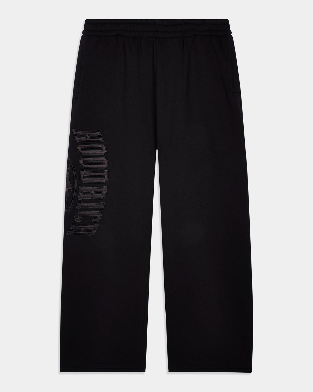 Black wide-leg sweatpants with a drawstring waistband and a tonal vertical 'HOODRICH' logo printed on the left leg, shown against a light gray background.