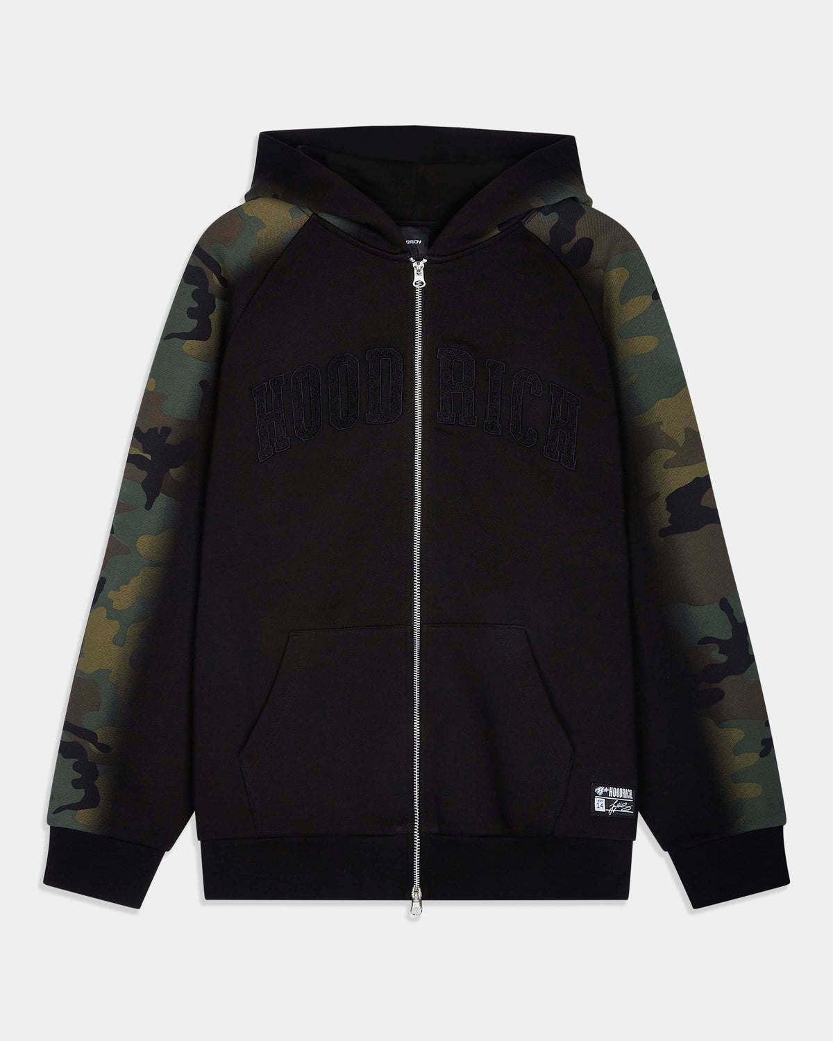 A black zip-up hoodie with camouflage patterned raglan sleeves and a tonal black 'HOODRICH' logo across the chest, displayed on a light gray background.