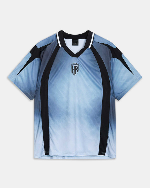 A short-sleeve athletic jersey with a light blue to white gradient body, black shoulder panels, and black vertical side stripes, featuring a black and white V-neck collar and a central crest with the letters HR.
