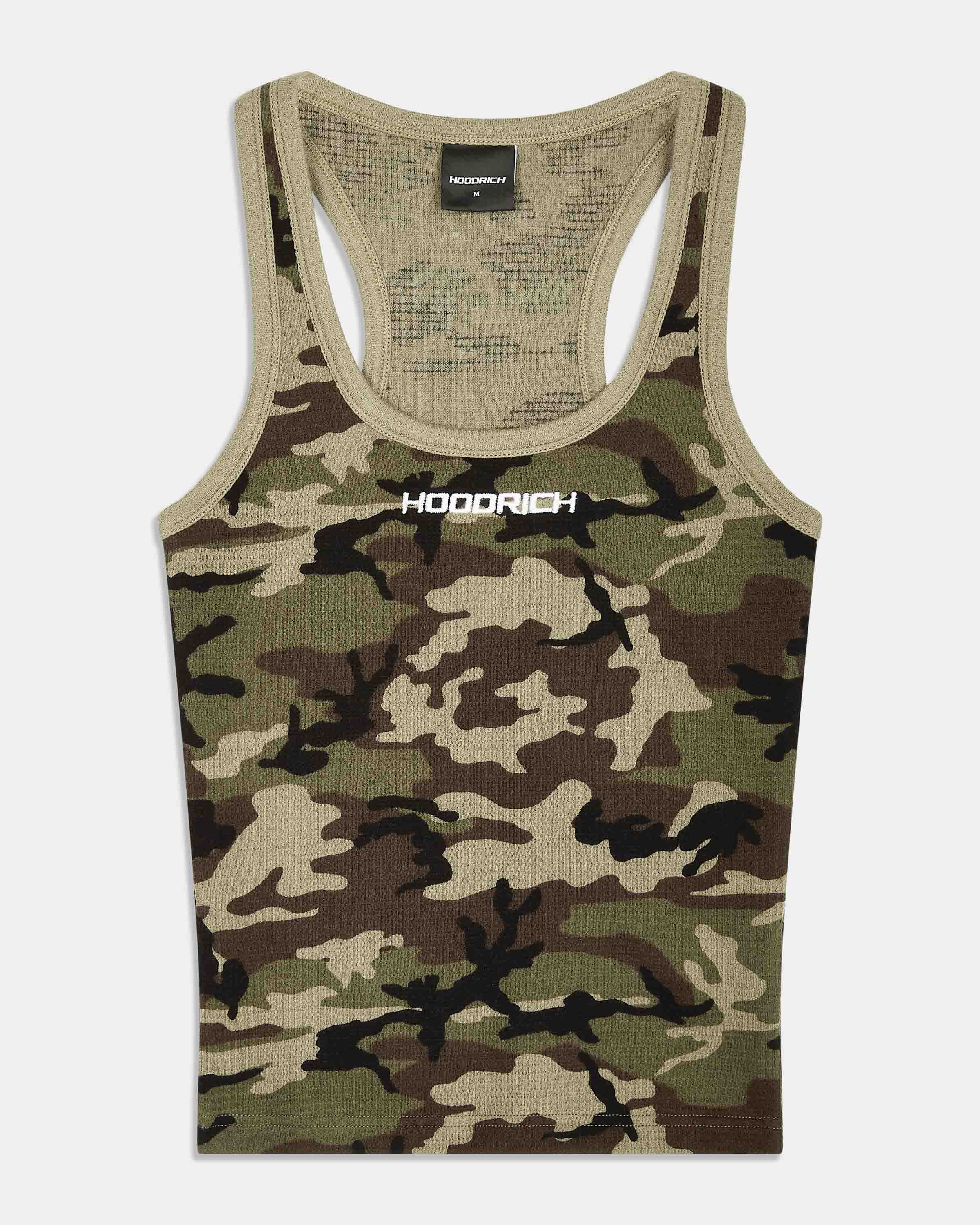 A sleeveless tank top with a green, brown, and beige camouflage pattern, featuring a white 'HOODRICH' logo printed on the chest. The tank top has a ribbed beige neckline and back straps, and is displayed flat against a light gray background.