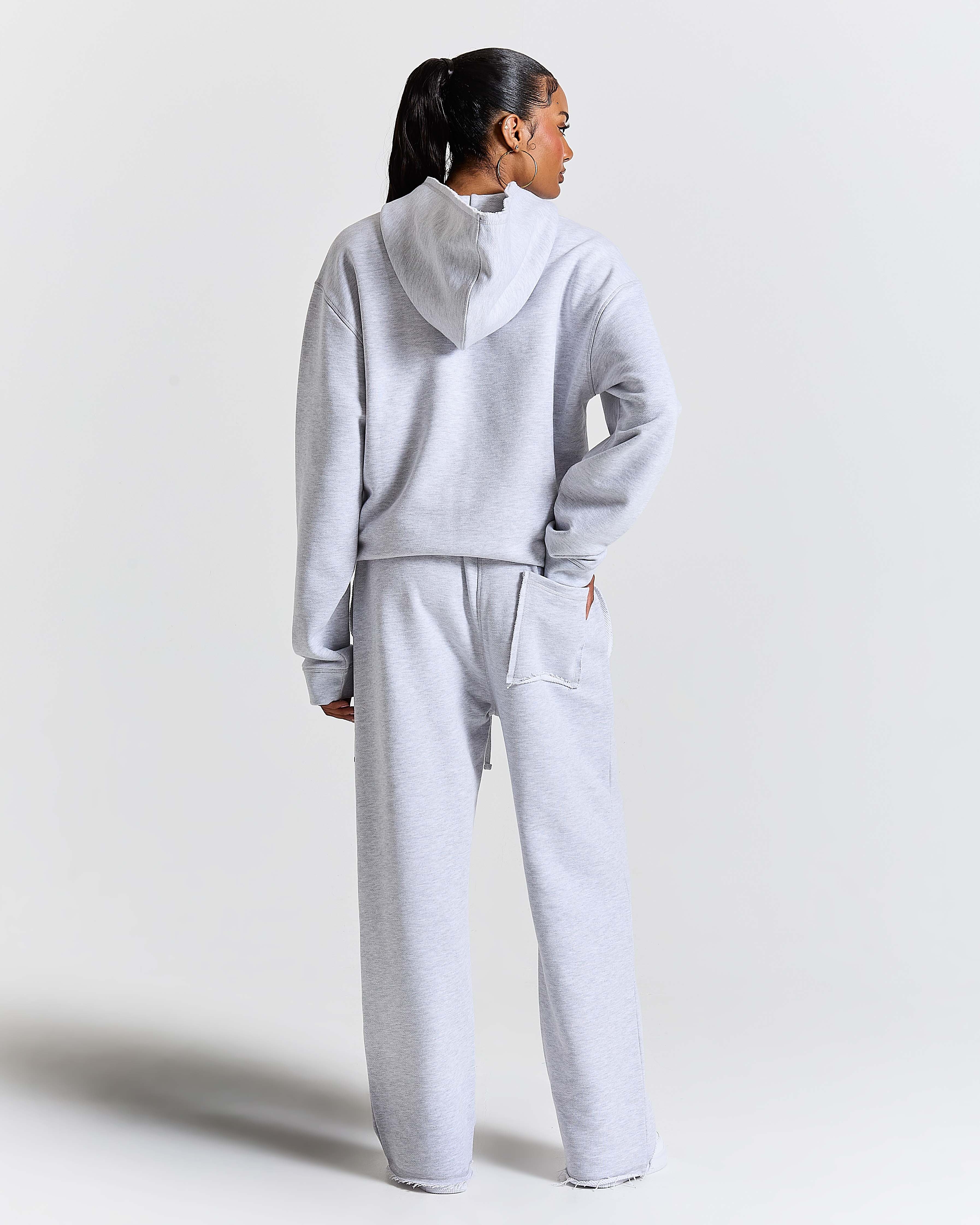 Displays a model wearing the Grey 'Hoodrich' branded Women's Frey Full Tracksuit 