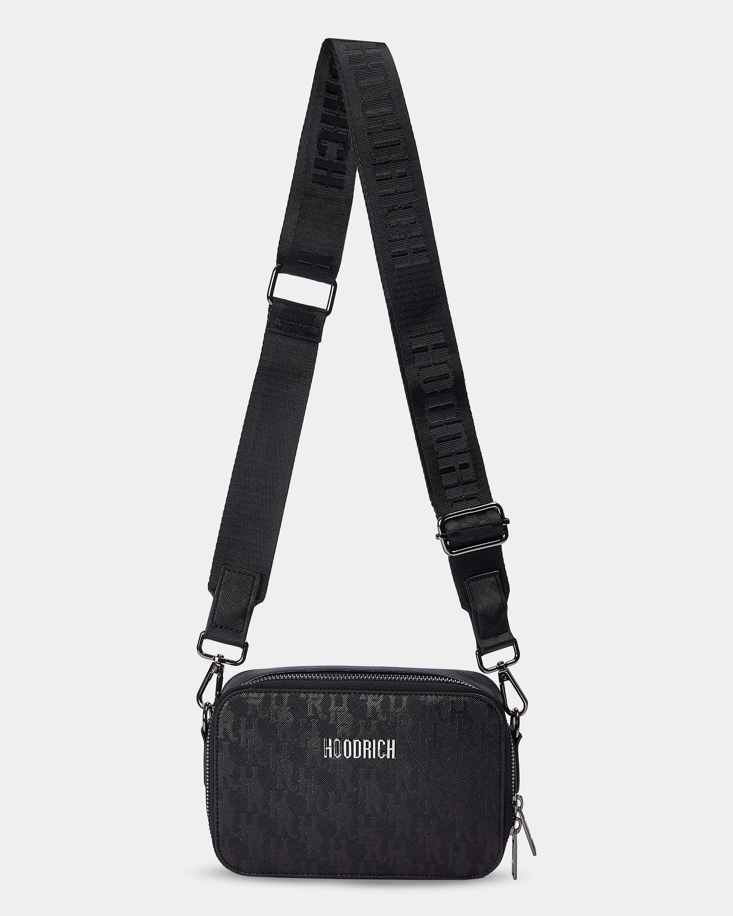Black crossbody bag with a visible brand logo on a white background